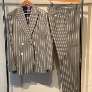 Double breasted suit. Grey with white stripes